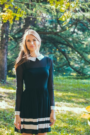 Outdoor Fashion Portrait of Pretty Hipster Vintage Girl Woman in the forest. Outdoor.の写真素材