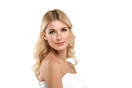 Blonde Woman Beautiful Portrait. Cosmetic concept, platinum Blond Hair Model Girl. Studio shot. Isolated on white.の写真素材