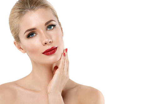 Woman nail manicure lipstick same color beauty portrait beautiful care. Isolated in white.の写真素材