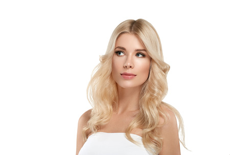 Blonde Woman Beautiful Portrait. Cosmetic concept, platinum Blond Hair Model Girl. Studio shot. Isolated on white.の写真素材