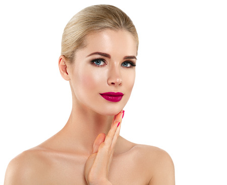 Woman nail manicure lipstick same color beauty portrait beautiful care. Isolated in white.の写真素材