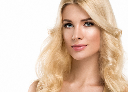 Blonde Woman Beautiful Portrait. Cosmetic concept, platinum Blond Hair Model Girl. Studio shot. Isolated on white.の写真素材