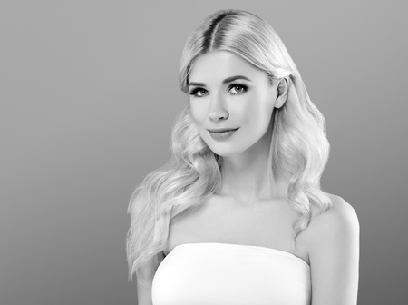 Woman headshot face blonde portrait closeup black and white. Studio shot.の写真素材