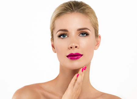 Woman nail manicure lipstick same color beauty portrait beautiful care. Isolated in white.の写真素材