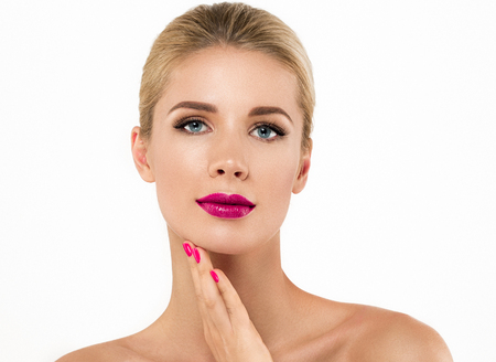 Woman nail manicure lipstick same color beauty portrait beautiful care. Isolated in white.の写真素材