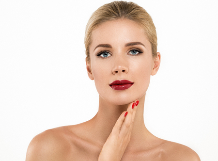 Woman nail manicure lipstick same color beauty portrait beautiful care. Isolated in white.の写真素材
