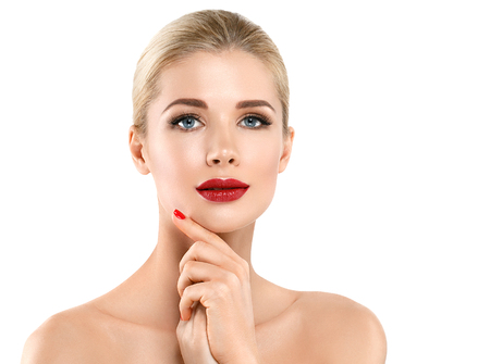 Woman nail manicure lipstick same color beauty portrait beautiful care. Isolated in white.の写真素材