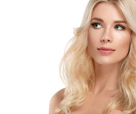 Blonde Woman Beautiful Portrait. Cosmetic concept, platinum Blond Hair Model Girl. Studio shot. Isolated on white.の写真素材