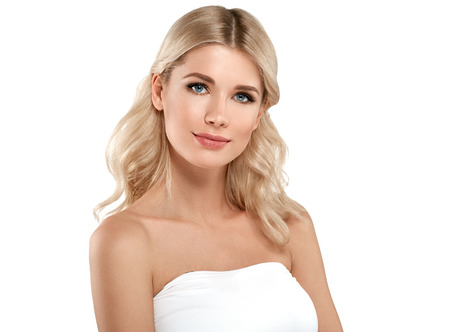 Blonde Woman Beautiful Portrait. Cosmetic concept, platinum Blond Hair Model Girl. Studio shot. Isolated on white.の写真素材