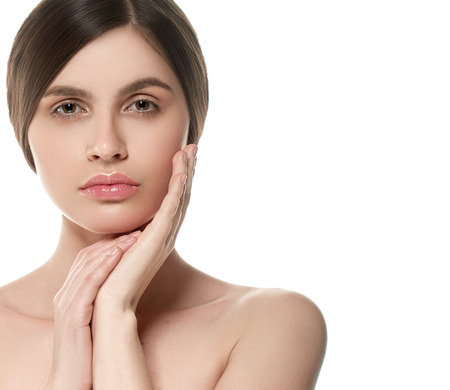 Beautiful Woman Face Portrait Beauty Skin Care Concept Beautiful beauty young female model girl touching her face skin cheeks hands fingers. Fashion Beauty Model isolated on whiteの写真素材