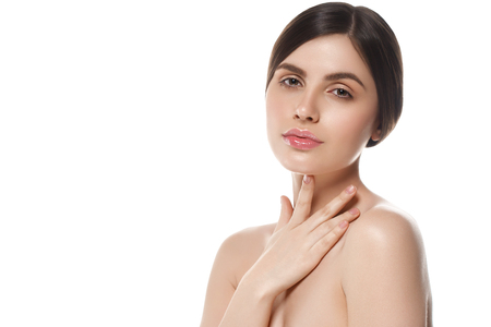 Beautiful Woman Face Portrait Beauty Skin Care Concept Beautiful beauty young female model girl touching her face skin cheeks hands fingers. Fashion Beauty Model isolated on whiteの写真素材