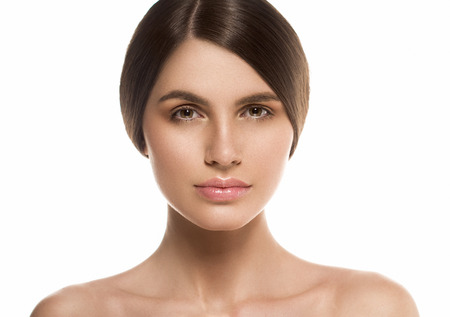 Beautiful Woman Face Portrait Beauty Skin Care Concept Beautiful beauty young female model girl touching her face skin cheeks hands fingers. Fashion Beauty Model isolated on whiteの写真素材