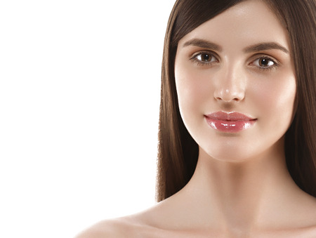 Beautiful Woman Face Portrait Beauty Skin Care Concept Beautiful beauty young female model girl touching her face skin cheeks hands fingers. Fashion Beauty Model isolated on whiteの写真素材
