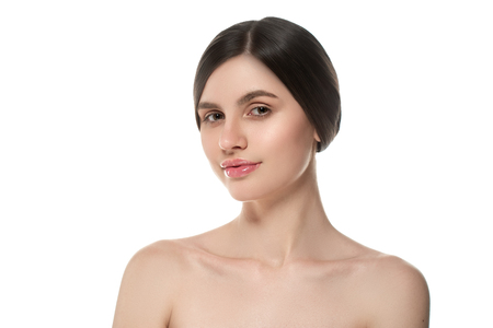 Beautiful Woman Face Portrait Beauty Skin Care Concept Beautiful beauty young female model girl touching her face skin cheeks hands fingers. Fashion Beauty Model isolated on whiteの写真素材