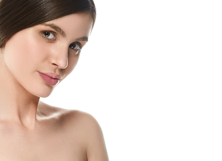 Beautiful Woman Face Portrait Beauty Skin Care Concept Beautiful beauty young female model girl touching her face skin cheeks hands fingers. Fashion Beauty Model isolated on whiteの写真素材