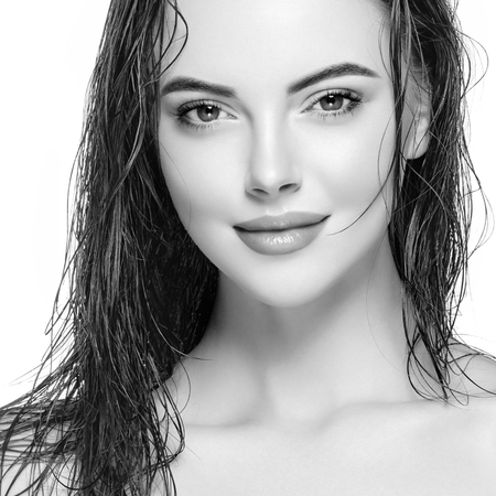 Woman face young beautiful healthy skin portrait black and white. Studio shot.の写真素材