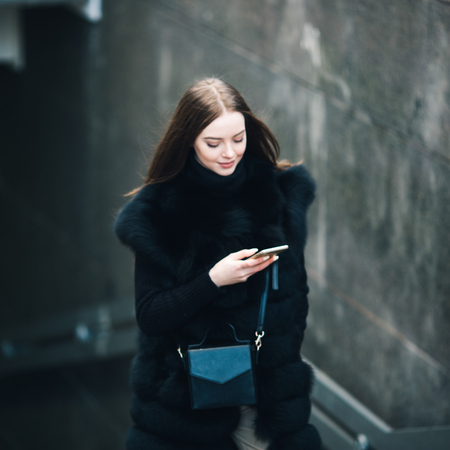 Winter Beautiful woman city portrait cold time. Outdoor shot.の写真素材