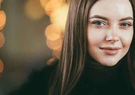 Winter Beautiful woman city portrait cold time. Outdoor shot.の写真素材