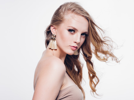 Eyelashes woman eyes face close up with beautiful long lashes isolated on white. Studio shot.の写真素材