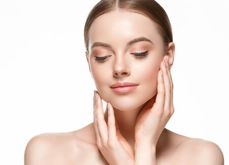 Beautiful woman female skin care healthy hair and skin close up face beauty portrait. Studio shot.の写真素材