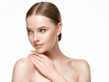 Beautiful woman female skin care healthy hair and skin close up face beauty portrait. Studio shot.の写真素材