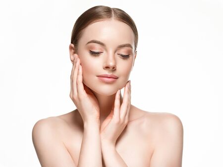Beautiful woman female skin care healthy hair and skin close up face beauty portrait. Studio shot.の写真素材