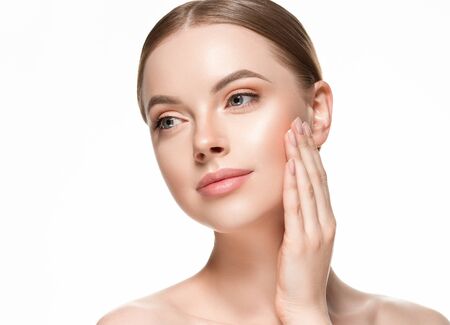 Beautiful woman female skin care healthy hair and skin close up face beauty portrait. Studio shot.の写真素材