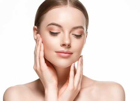 Beautiful woman female skin care healthy hair and skin close up face beauty portrait. Studio shot.の写真素材
