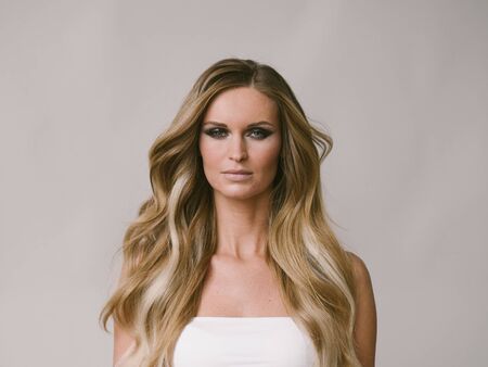 Beautiful woman long hair blonde natural portrait with beauty makeup. Studio shot.の写真素材
