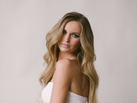 Beautiful woman long hair blonde natural portrait with beauty makeup. Studio shot.の写真素材