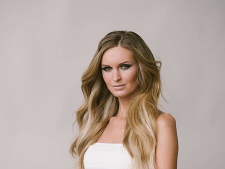 Beautiful woman long hair blonde natural portrait with beauty makeup. Studio shot.の写真素材