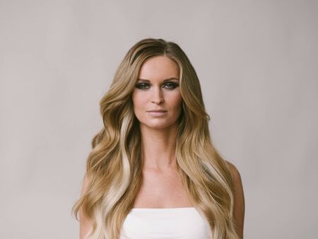 Beautiful woman long hair blonde natural portrait with beauty makeup. Studio shot.の写真素材