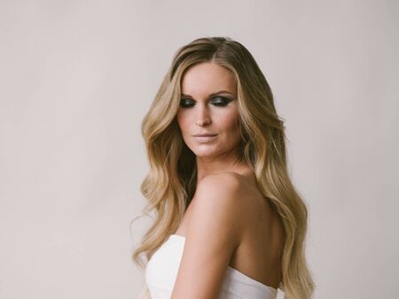 Beautiful woman long hair blonde natural portrait with beauty makeup. Studio shot.の写真素材