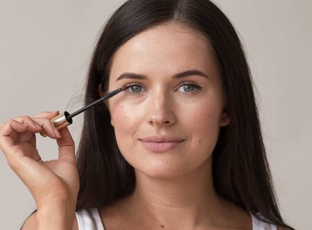 Woman makeup mascara eyes healthy skin natural fashion makeup. Studio shot.の写真素材