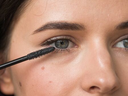 Woman makeup mascara eyes healthy skin natural fashion makeup. Studio shot.の写真素材