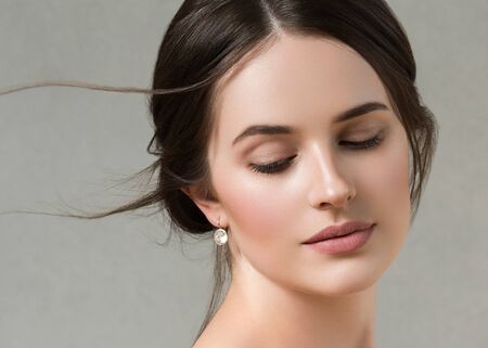 Beautiful woman portrait beauty hair and skin makeup young model. Studio shot.の写真素材
