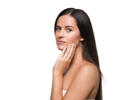 Beauty skin woman face healthy skin beautiful model close up face natural makeup brunette hair. Isolated on white. Studio shot.の写真素材