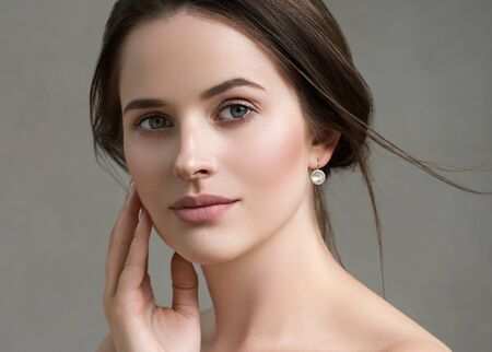 Beautiful woman portrait beauty hair and skin makeup young model. Studio shot.の写真素材