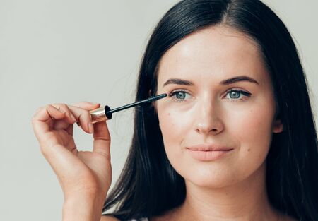 Woman makeup mascara eyes healthy skin natural fashion makeup. Studio shot.の写真素材