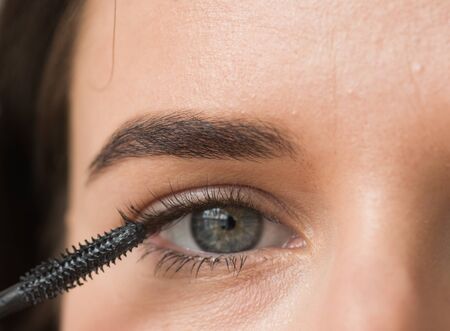 Woman makeup mascara eyes healthy skin natural fashion makeup. Studio shot.の写真素材