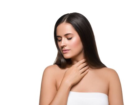 Beauty skin woman face healthy skin beautiful model close up face natural makeup brunette hair. Isolated on white. Studio shot.の写真素材