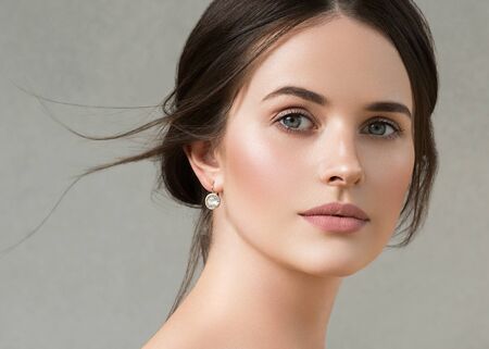 Beautiful woman portrait beauty hair and skin makeup young model. Studio shot.の写真素材