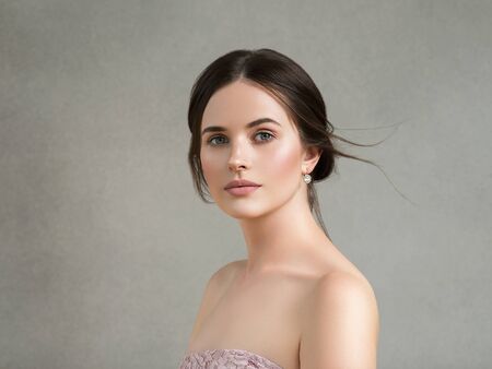 Beautiful woman portrait beauty hair and skin makeup young model. Studio shot.の写真素材