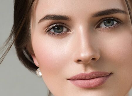 Beautiful woman portrait beauty hair and skin makeup young model. Studio shot.の写真素材