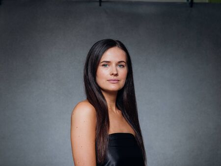 Beautiful woman art concept long brunette hair natural makeup fashion picture. Studio shot.の写真素材