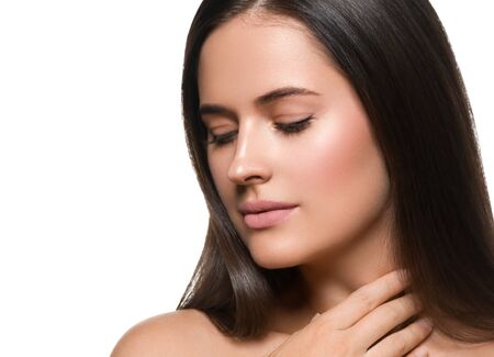 Beauty skin woman face healthy skin beautiful model close up face natural makeup brunette hair. Isolated on white. Studio shot.の写真素材