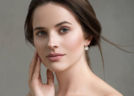 Beautiful woman portrait beauty hair and skin makeup young model. Studio shot.の写真素材