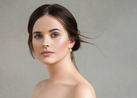 Beautiful woman portrait beauty hair and skin makeup young model. Studio shot.の写真素材