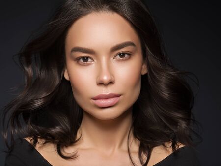 Red lips woman beauty face asian female. Studio shot.の写真素材