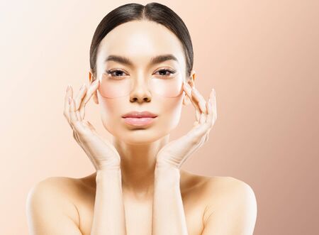 Asia beauty woman healthy skin face clean fresh skin spa. Studio shot. Color background.の写真素材